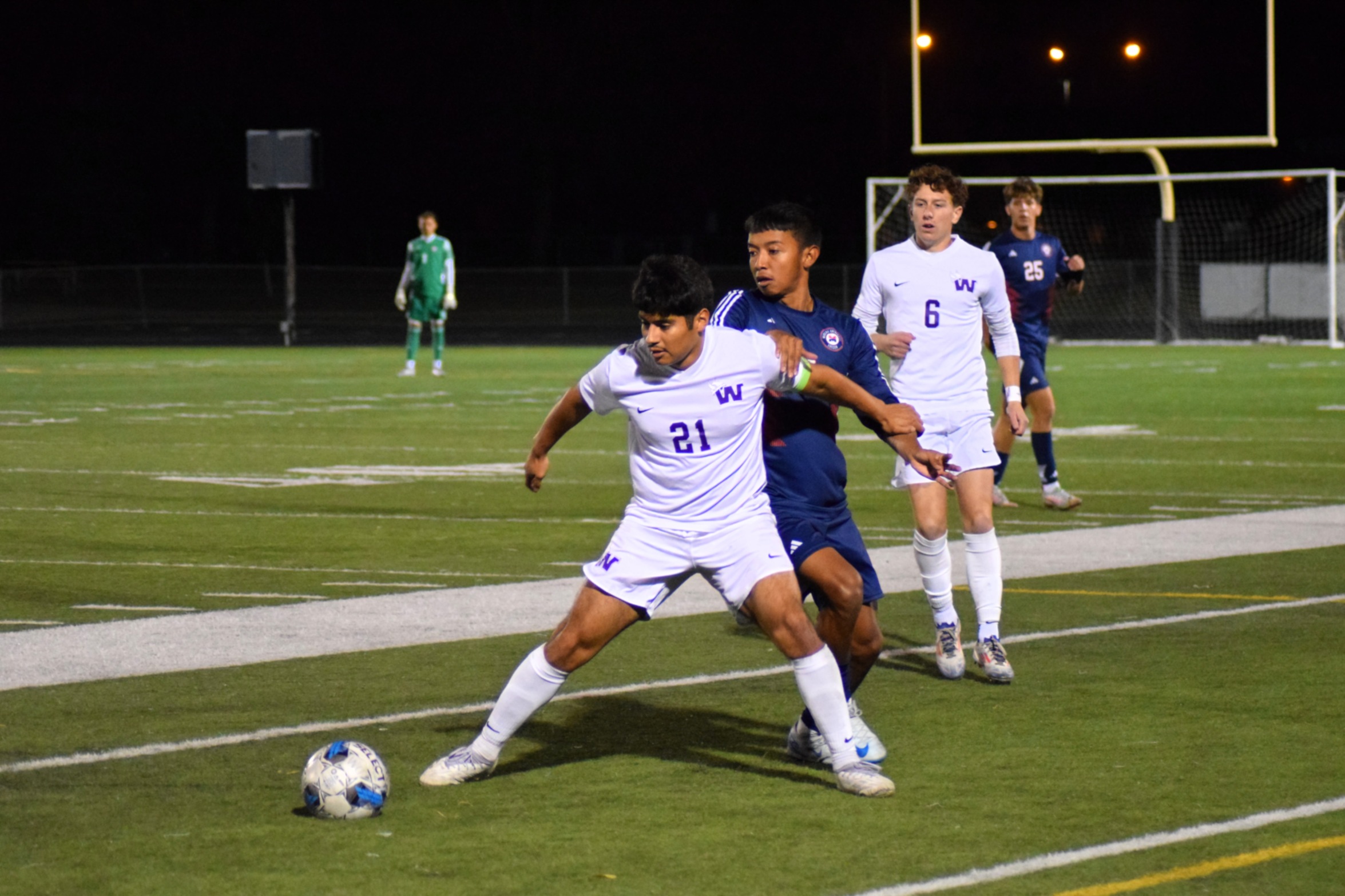 Midland tops men's soccer